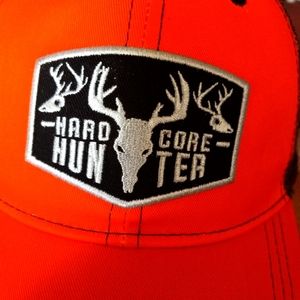 Hard Core Hunter trucker hat. Orange and came. One size fits most